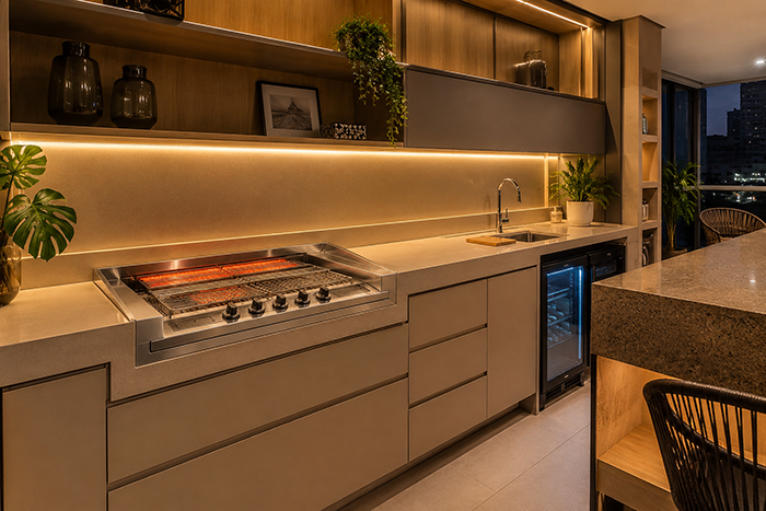 Área gourmet moderna com Churrasqueira Elétrica de Embutir para Varanda Gourmet, bancada planejada, armários minimalistas, iluminação LED quente, apartamento contemporâneo de alto padrão, design clean, fotografia arquitetônica premium, ultra detalhado